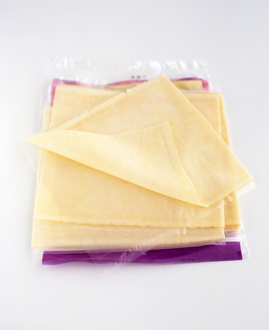 A stack of processed cheese slices