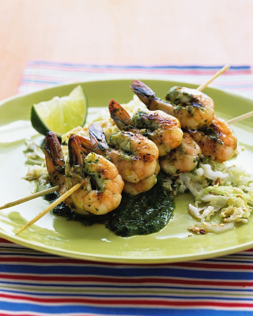 A prawn skewer with a lime & mint sauce