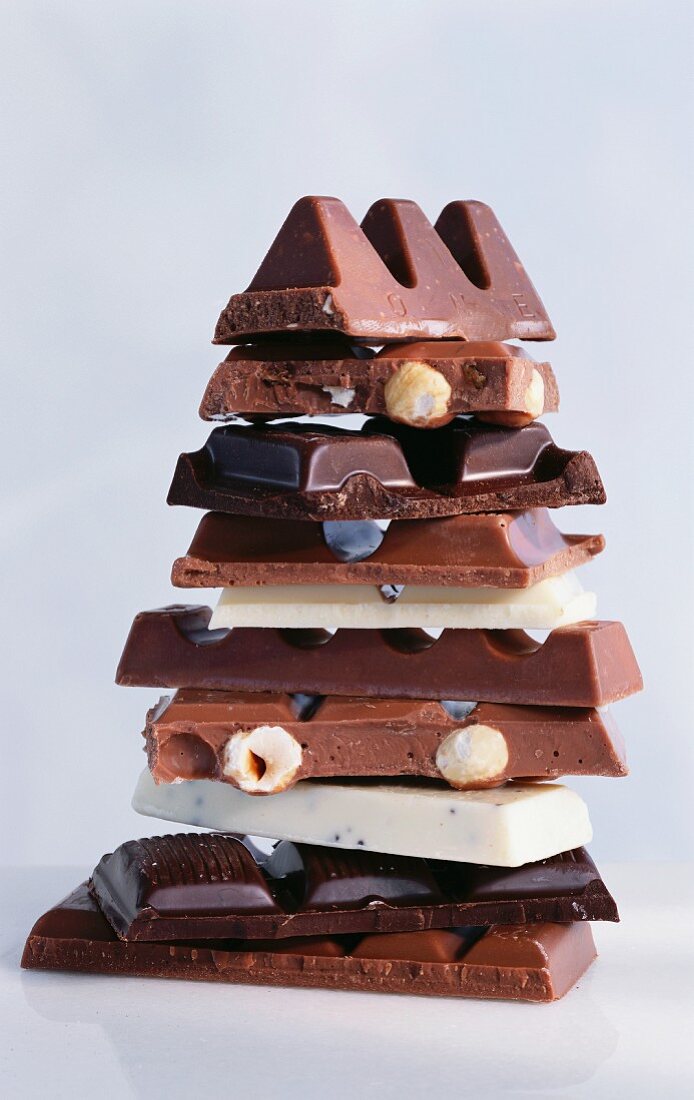 A tower of pieces of different kinds of chocolate