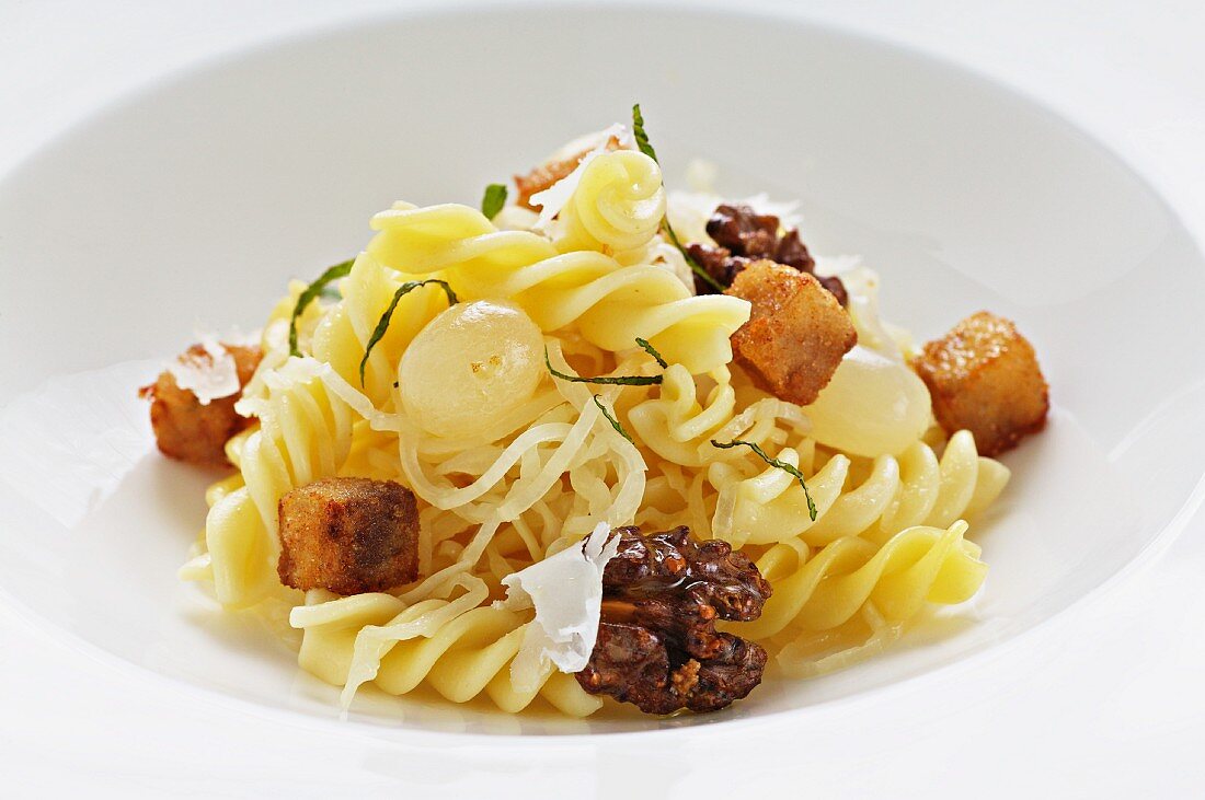 Herb pasta with grapes and calf's head