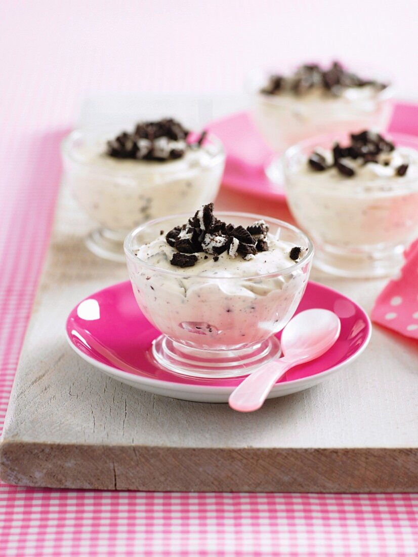 Creamy dessert with white chocolate, cream cheese and cookie crumbs