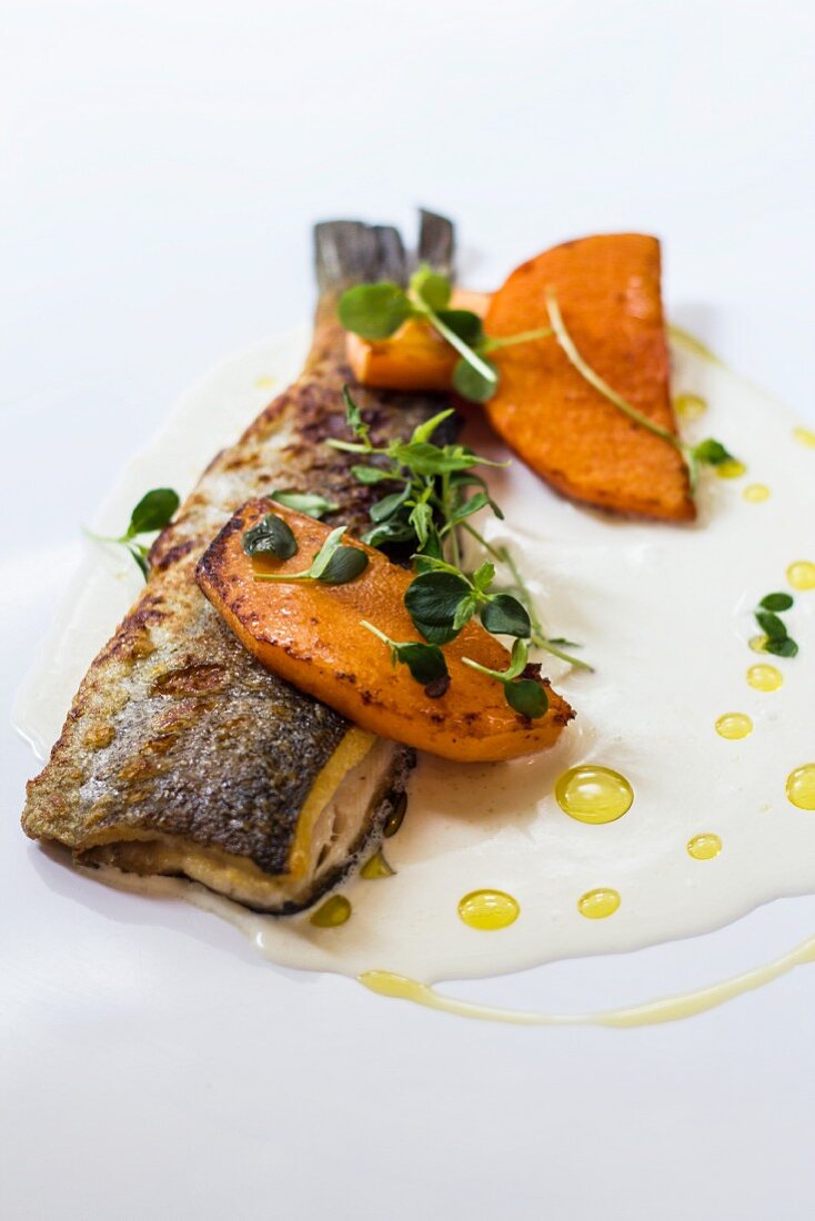 Grilled trout with pumpkin and butter sauce