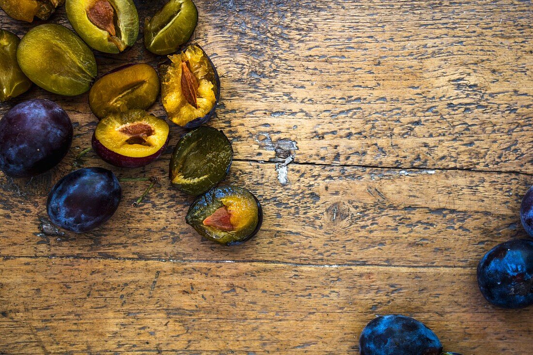 Plums on a wood table