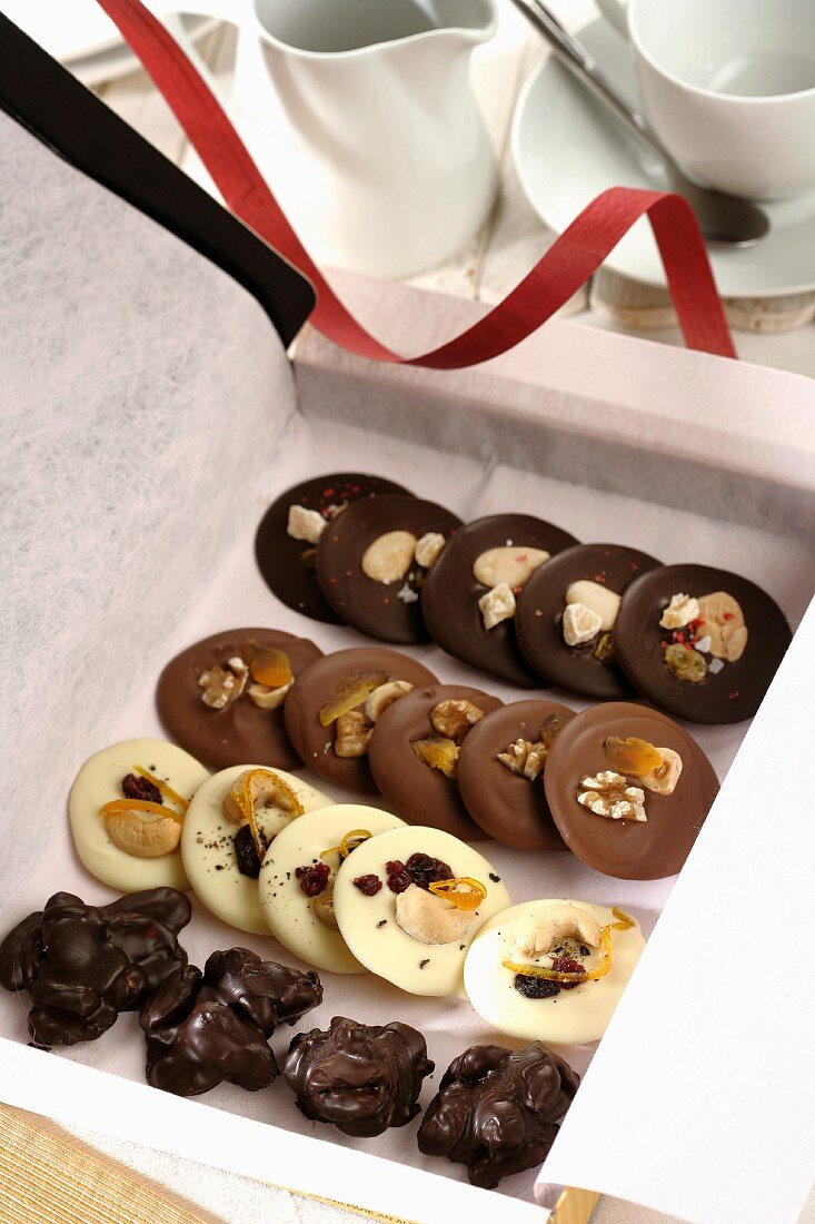 Chocolate cookies with nuts in a present box
