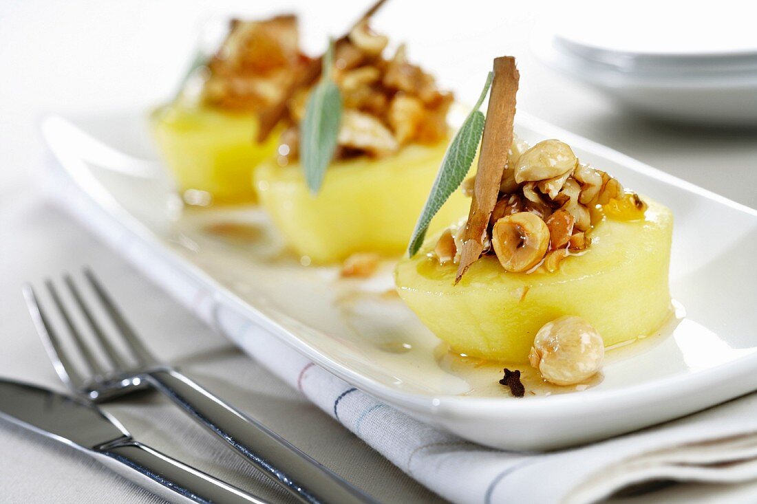 Poached apples with nuts and spices