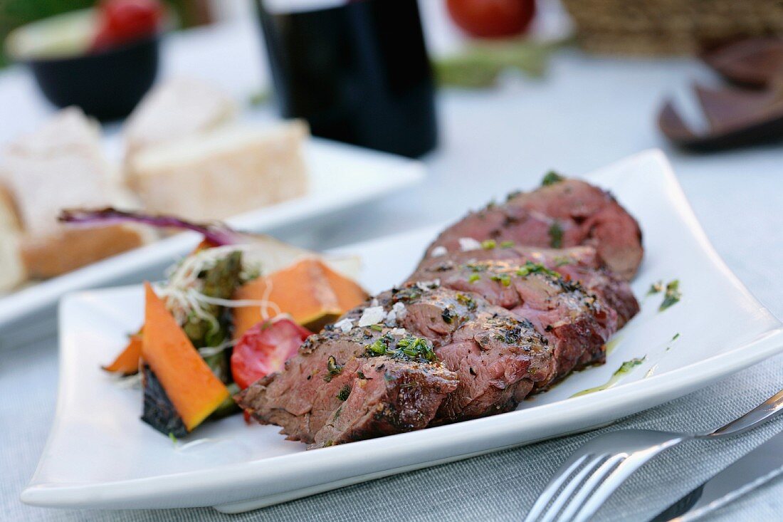 Roasted venison loin on the grill