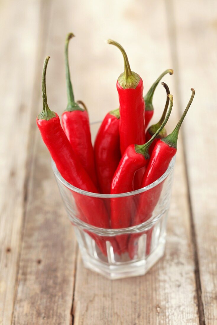 Fresh red chillies in a glass