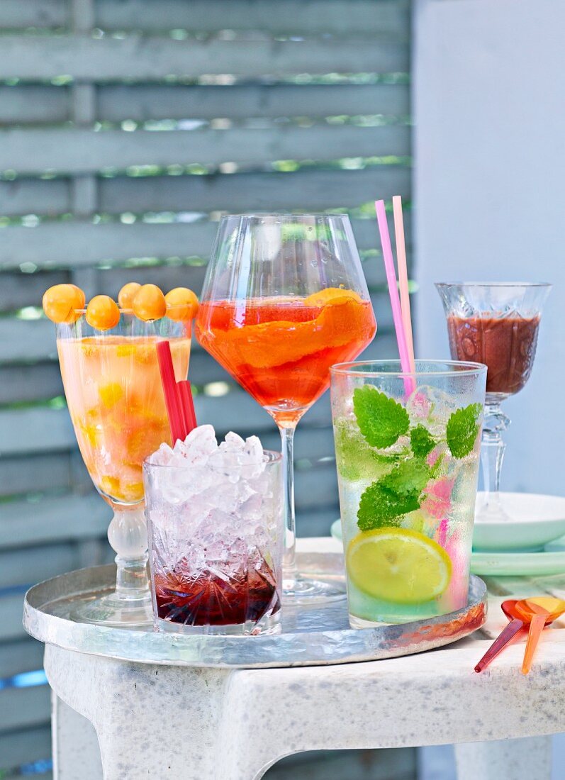 Assorted summer cocktails on a tray