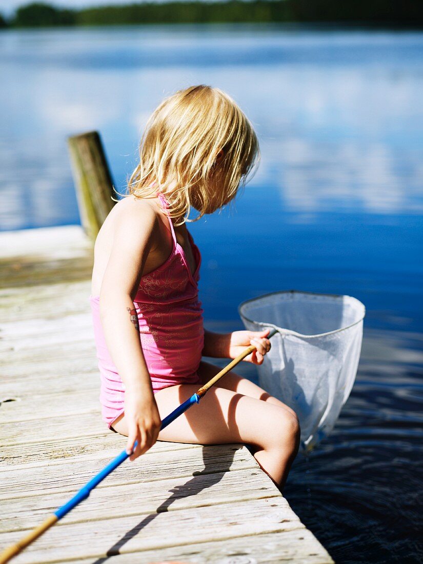 Little girl with fishing net