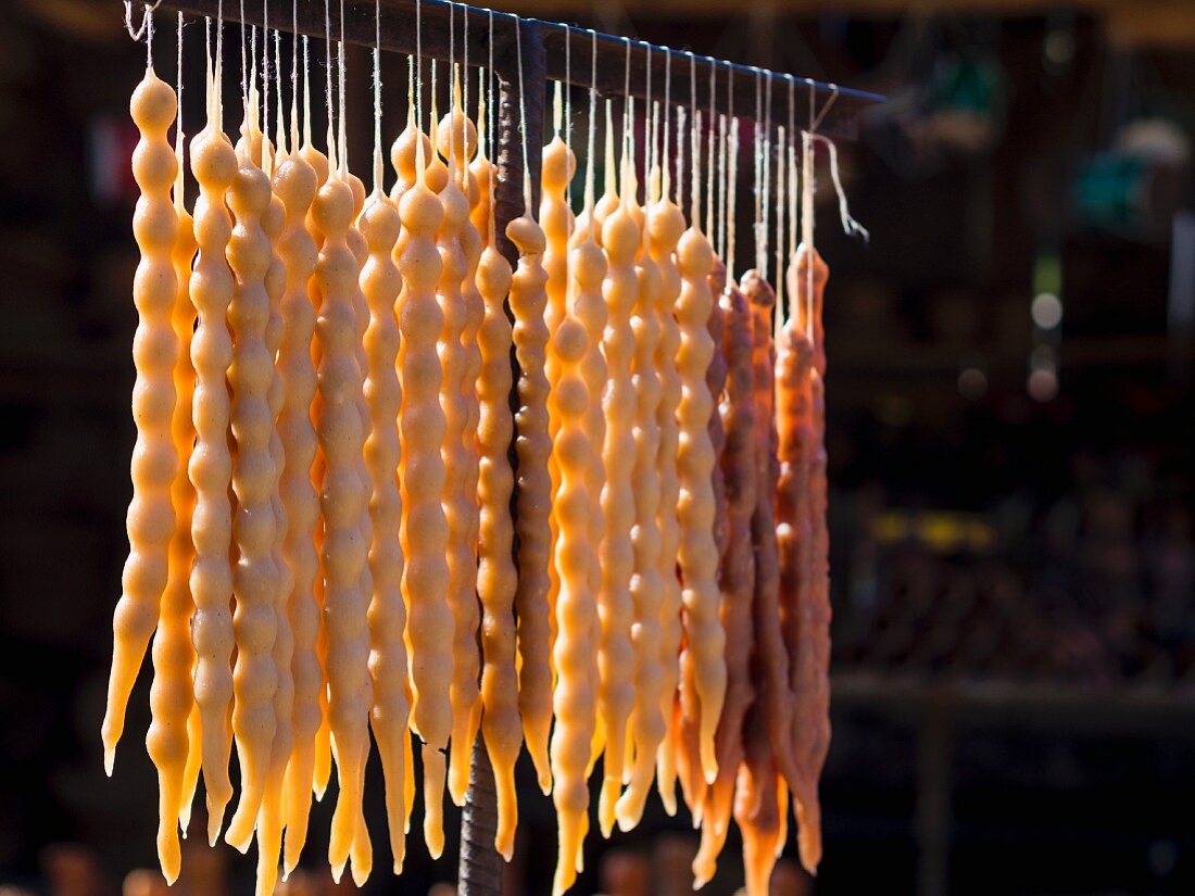 Georgian cuisine – churchkhela, a sausage-shaped candy also called the Georgian snickers.