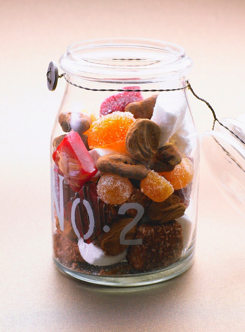 Jar with candies and candied fruits