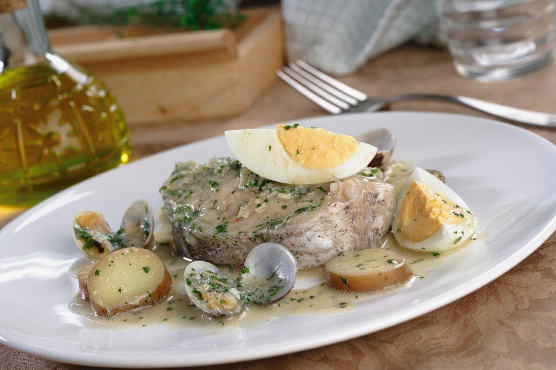 Merluza koskera (hake in a wine sauce with egg and potatoes)