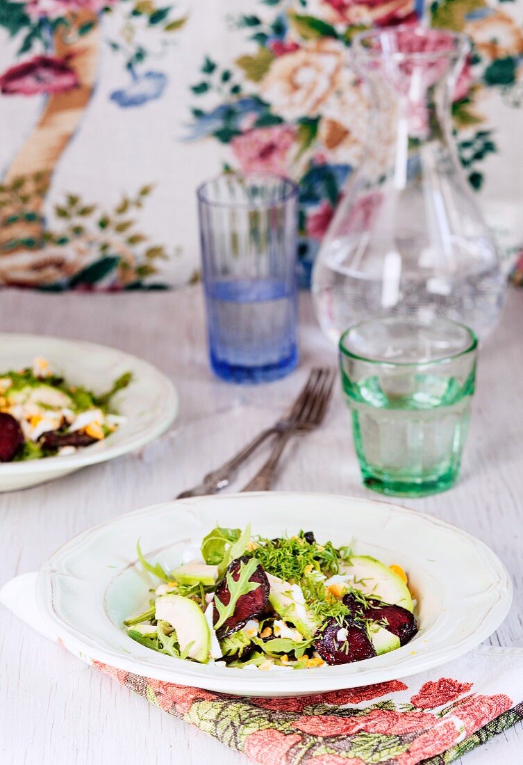 Salad with avocado, beetroot and egg