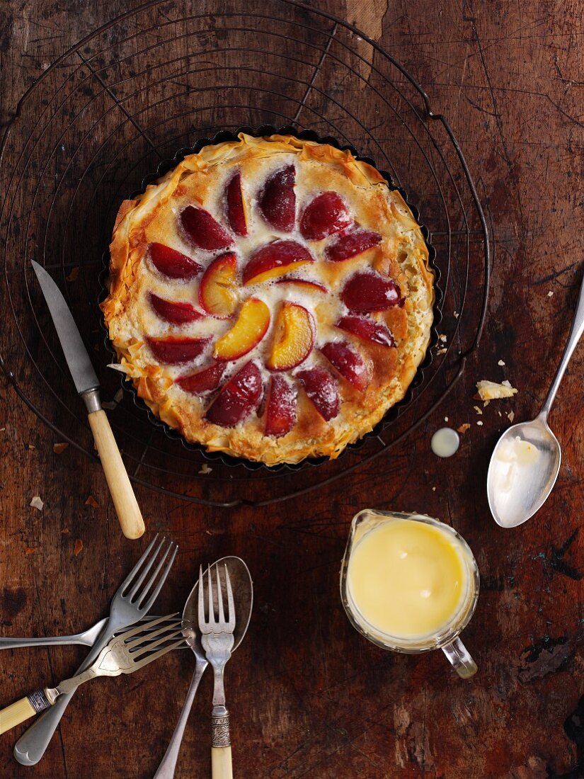 Plum tart with custard