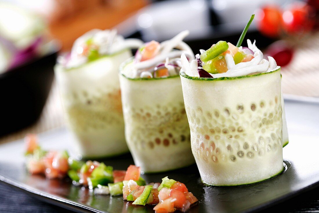 Rolled cucumber strips filled with seafood salad (Spain)