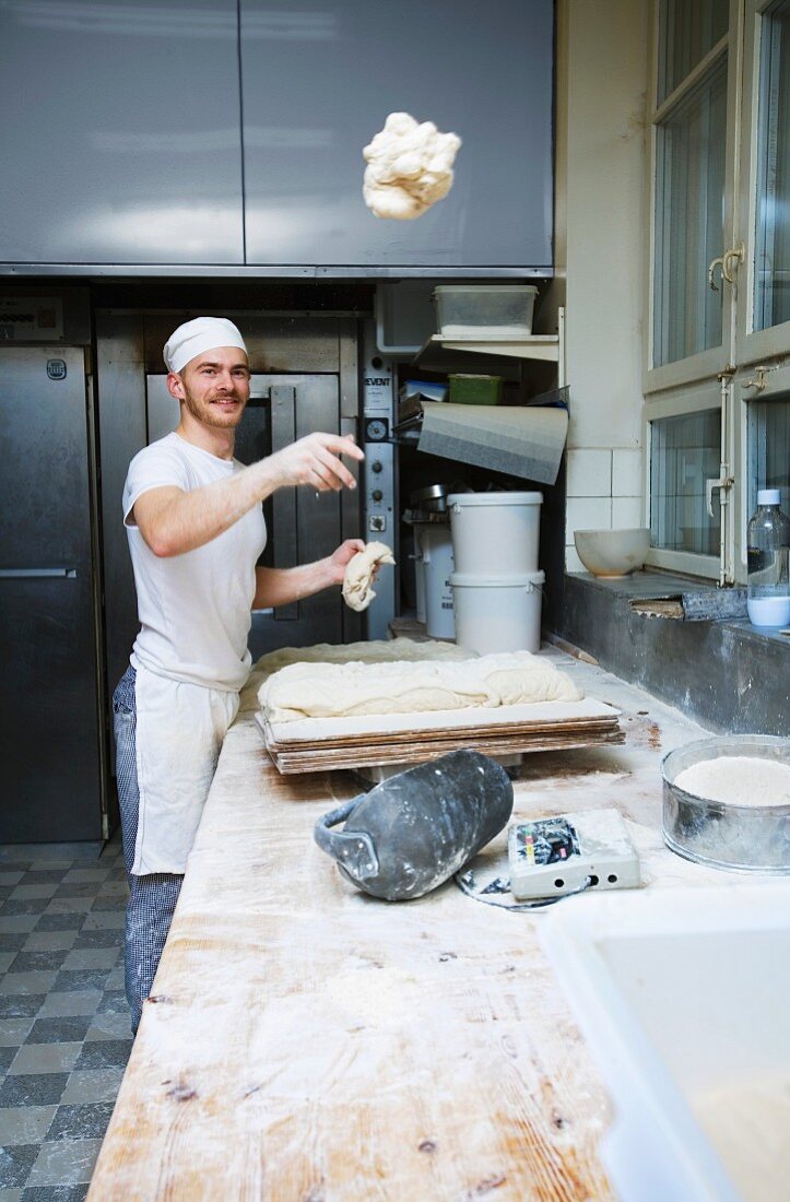 A baker in a bakery, Sweden.