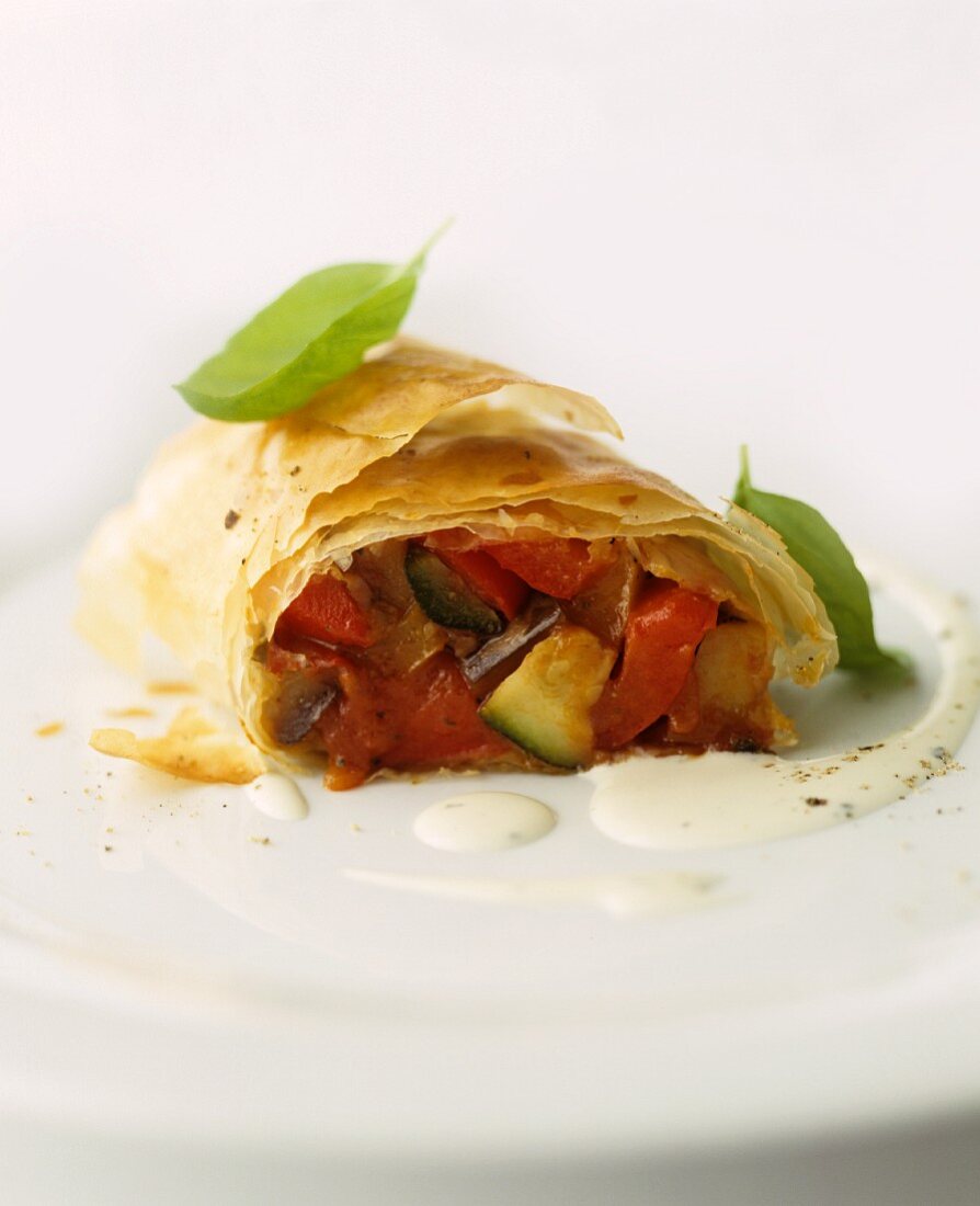 Vegetable strudel with tomatoes and courgette