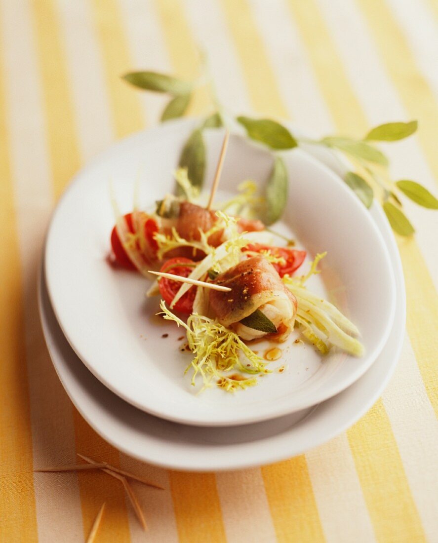 Saltimbocca with tomatoes and frisée lettuce