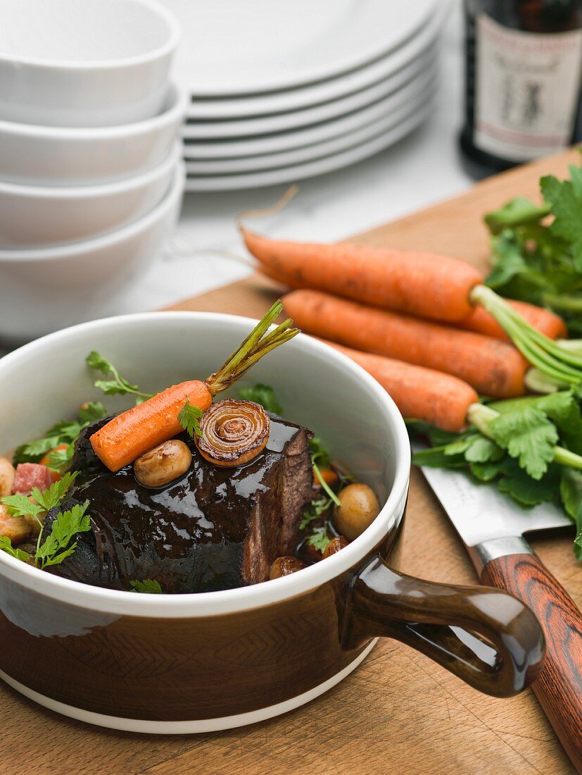 Meal with carrot in rustic pot