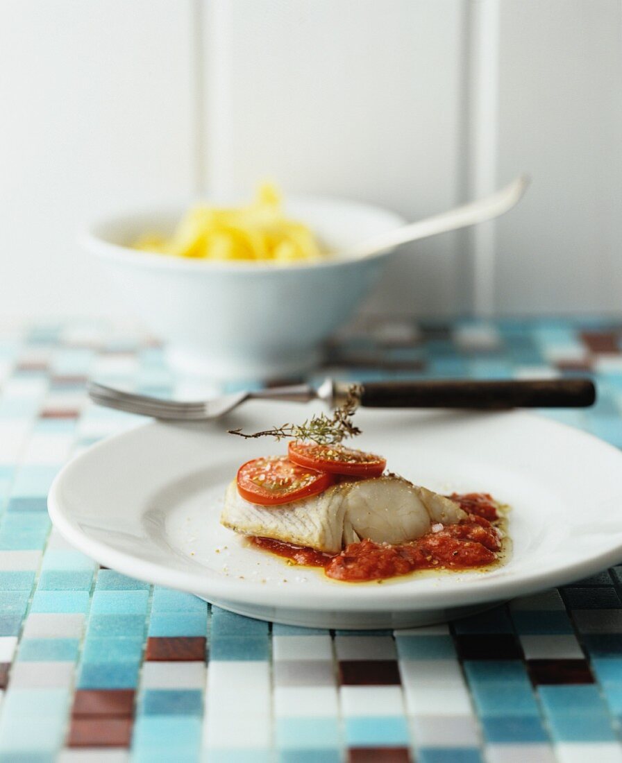 Fish fillet with tomatoes and thyme