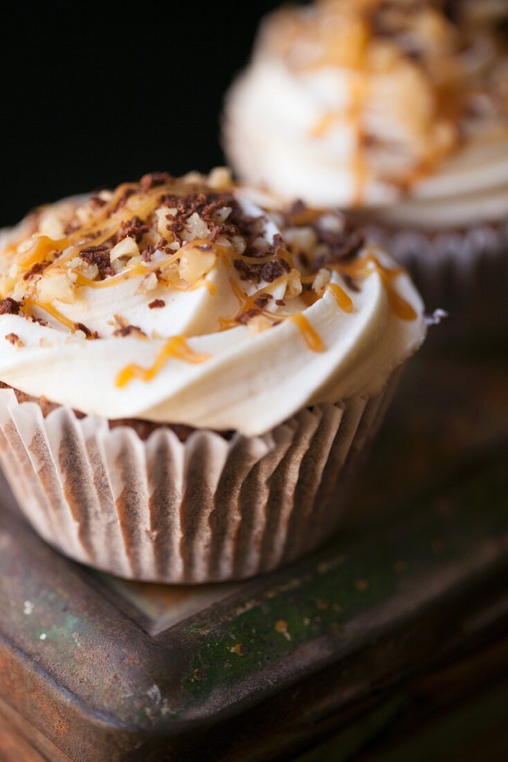 Brownie Cup Cake topped with Pecan and Caremel