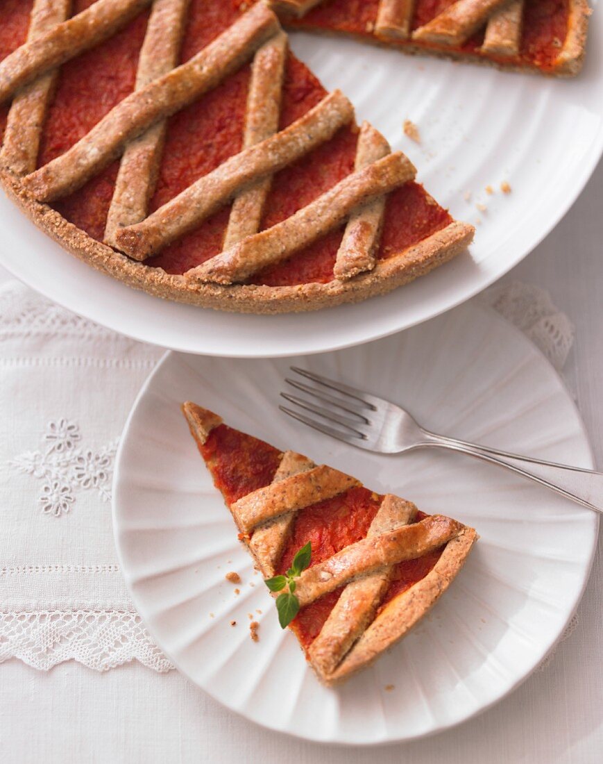 Linzer Torte (traditional lattice pie) with peppers and sage