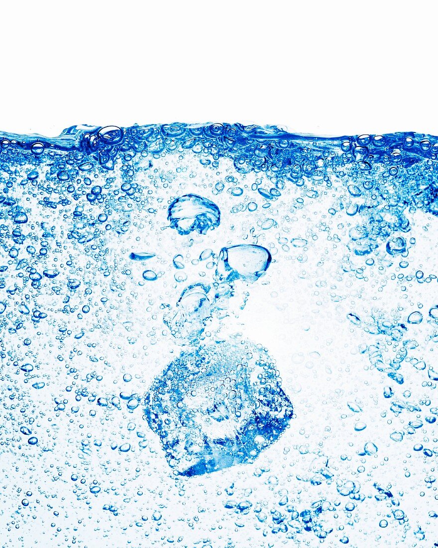 An ice cube in mineral water