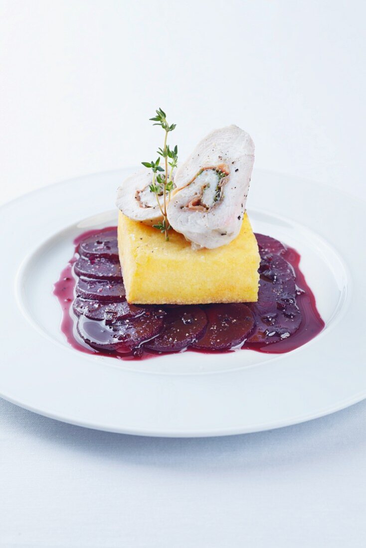 Rolled chicken breast, baked polenta and beetroot