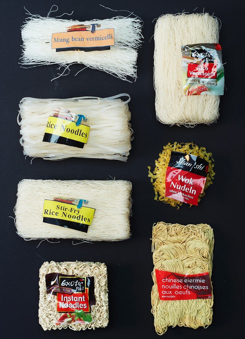 Assorted types of pasta from Asia, with labels