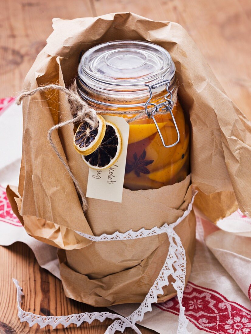 Jar with preserved orange slices