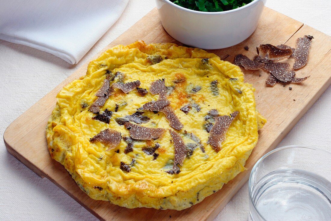 Black truffle s omelette with Cicorino salad, Italy