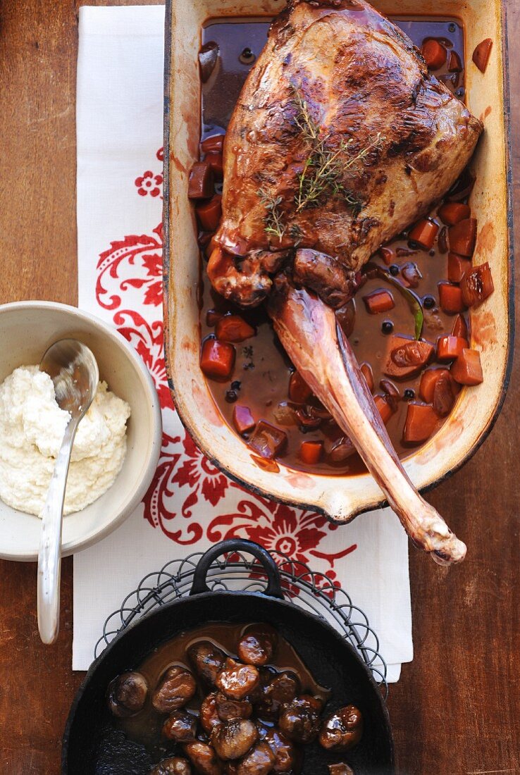 A leg of venison with mashed parsley and chestnuts