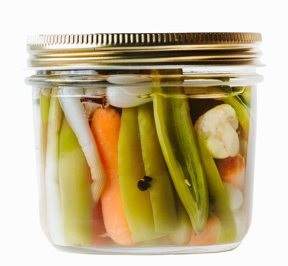 Vegetables pickled in vinegar, in a screw-top jar