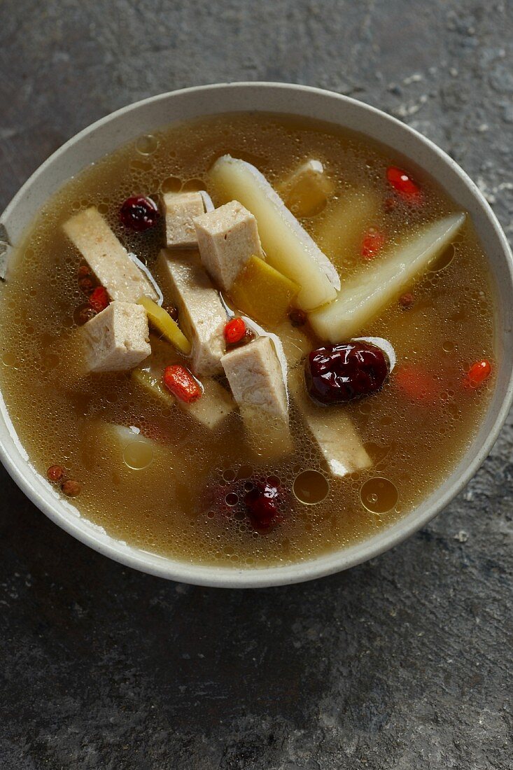 Vegetarian chicken soup with potatoes, red dates and goji berries