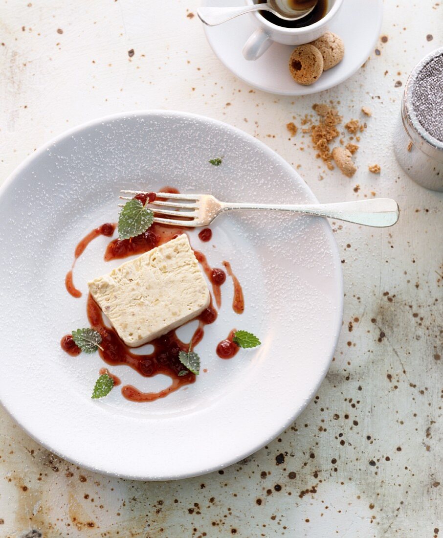 Semifreddo with a berry sauce (Italy)