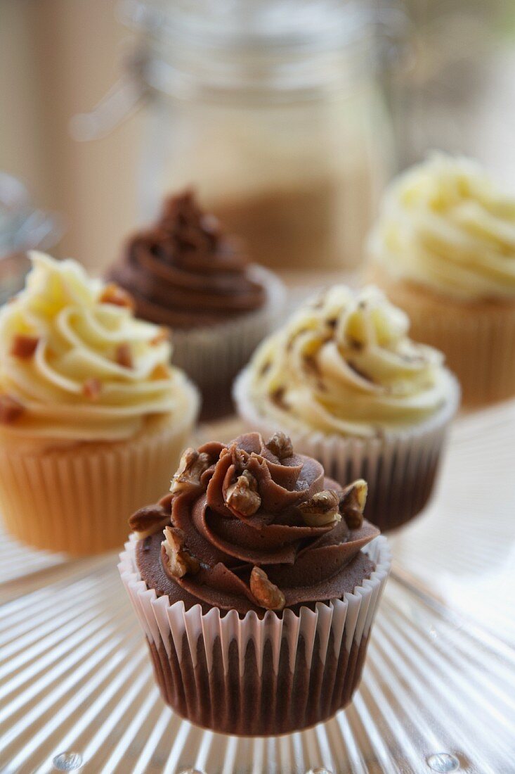 Chocolate, vanilla and caramel cupcakes