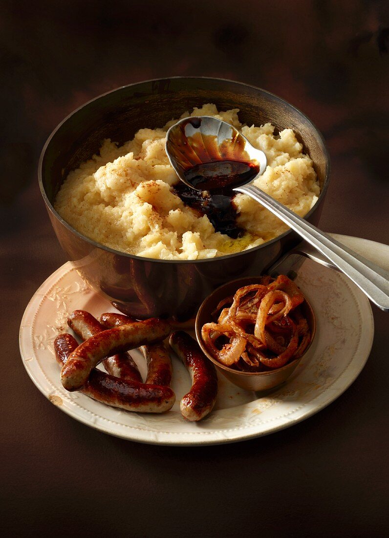 Celeriac mash with fried sausages, fried onions and a caramelised balsamic vinegar sauce