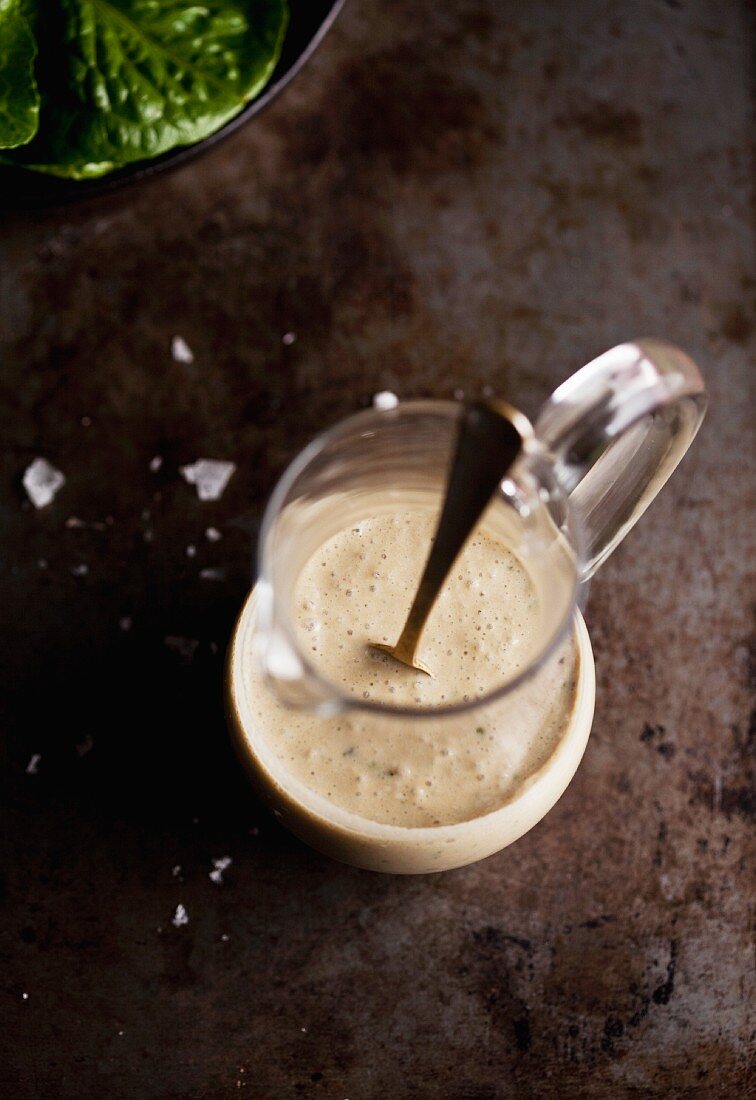 Salad dressing in a glass jug