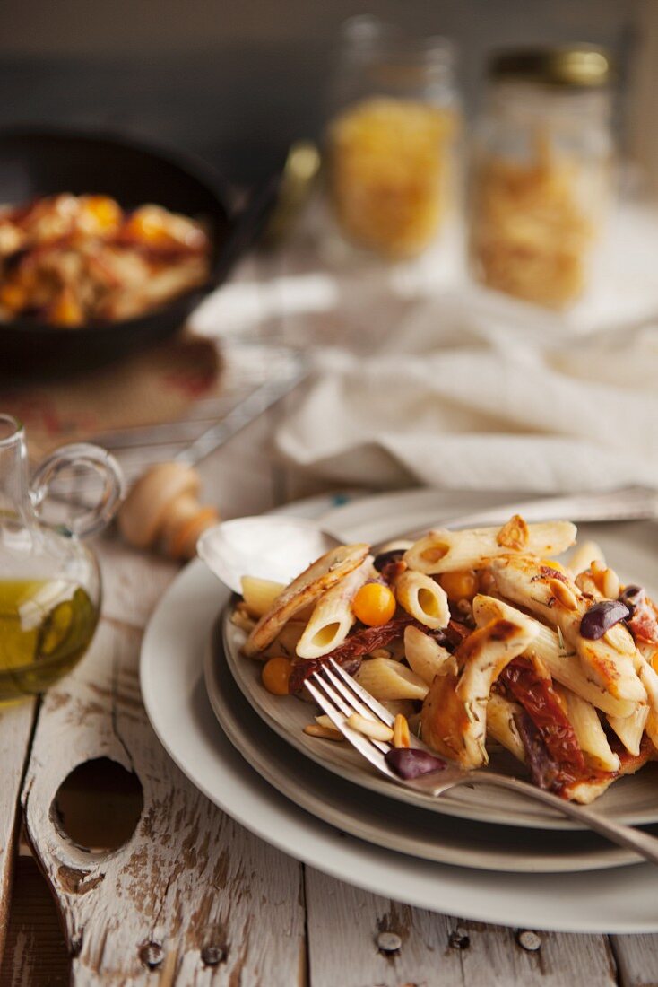 Penne with chicken, Kalamata olives, tomatoes and pine nuts