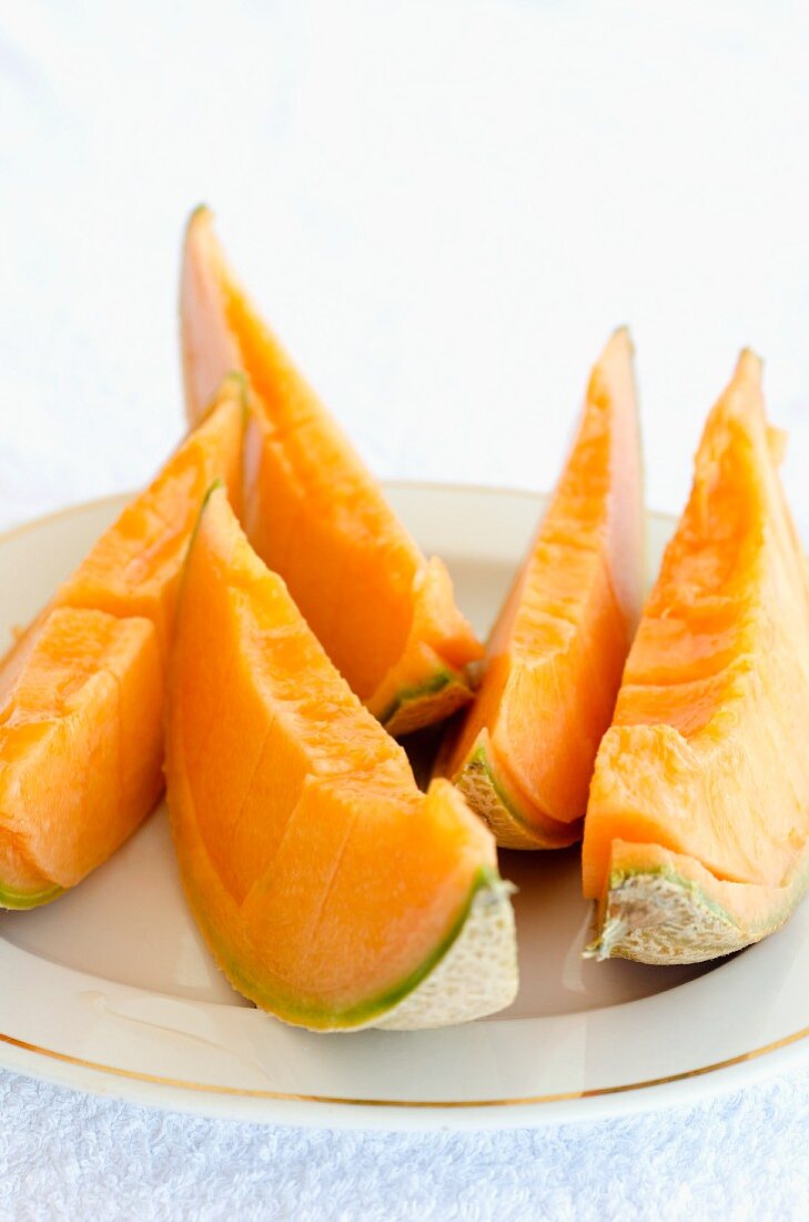 Slices of Cavaillon melon on a plate