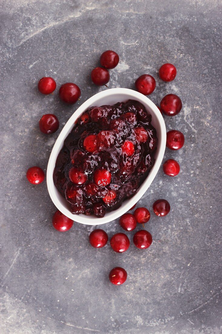 Cranberry jam and fresh cranberries (view from above)