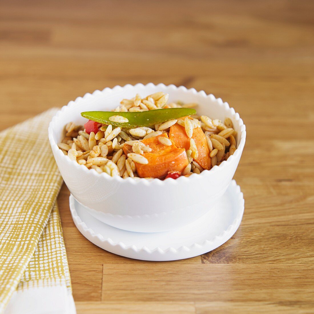 Sweet potato orzo with peppers, and sugar snap peas