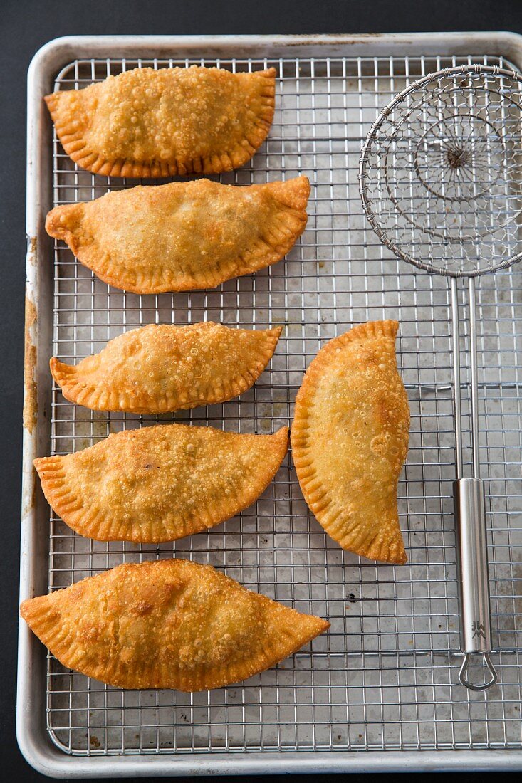Fried Meat Pies on a Wire Rack