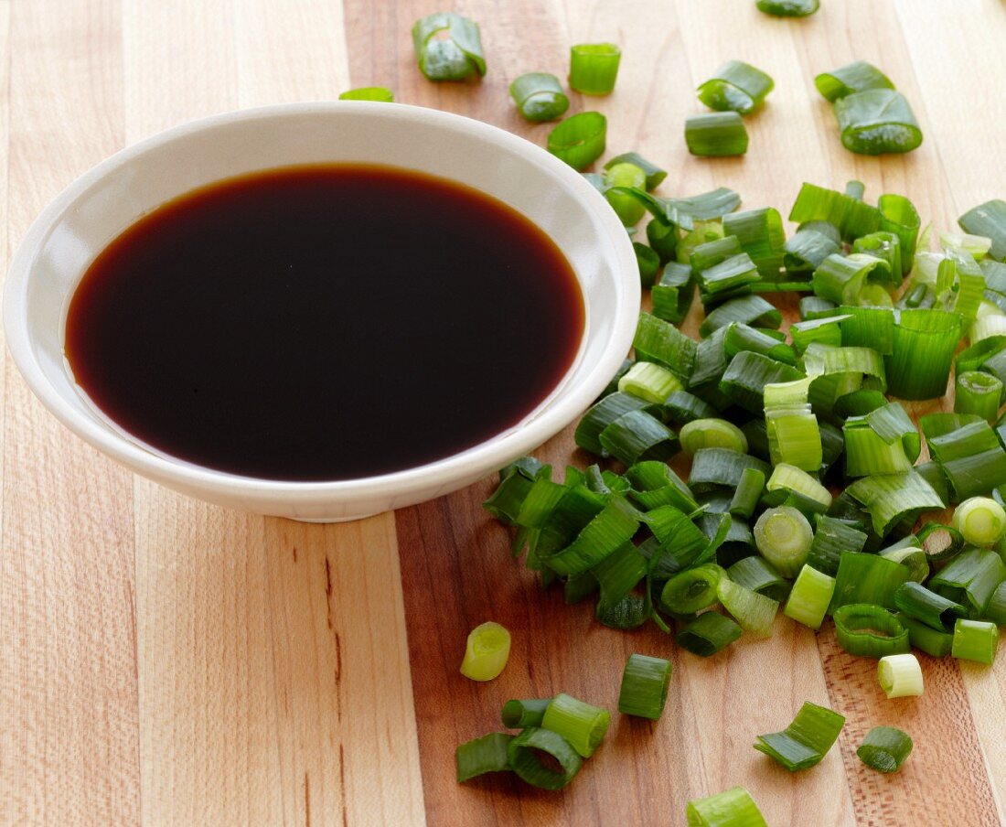 Chopped Scallion and a small Bowl of Soy Sauce