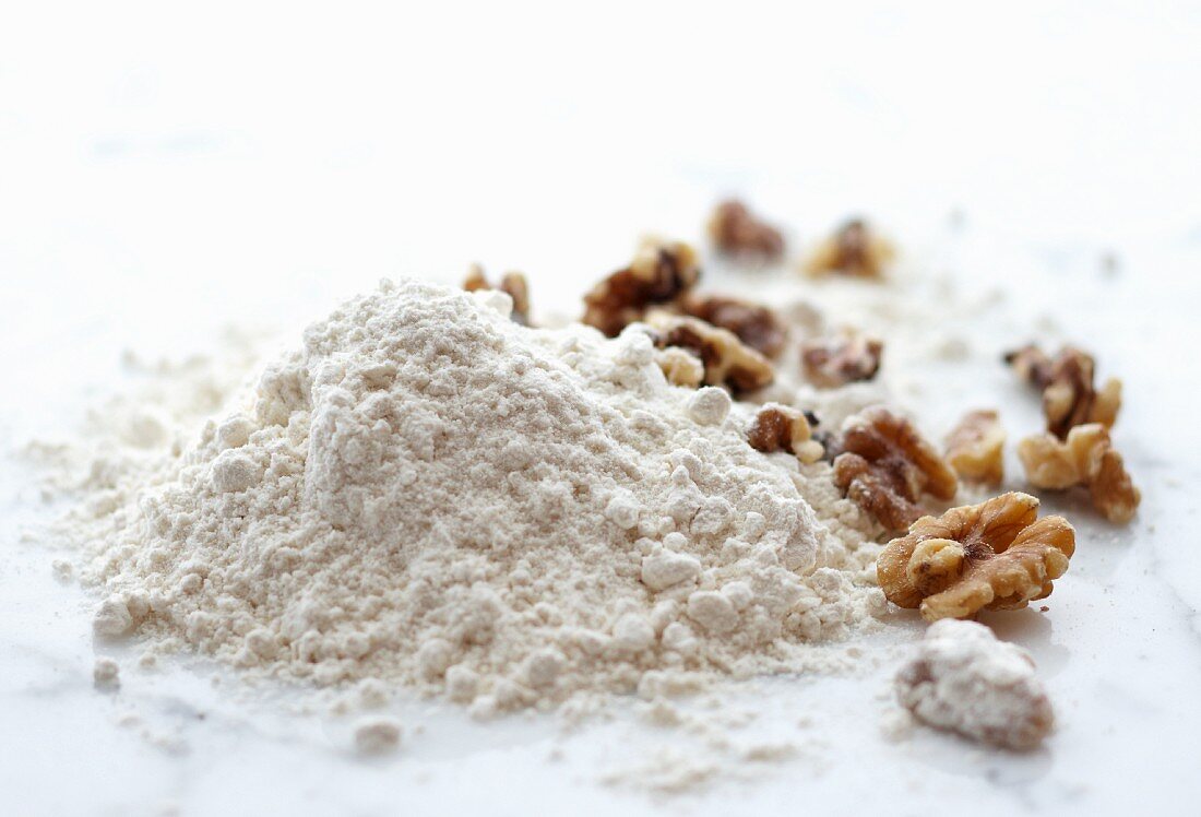A Mound of White Flour and Walnuts