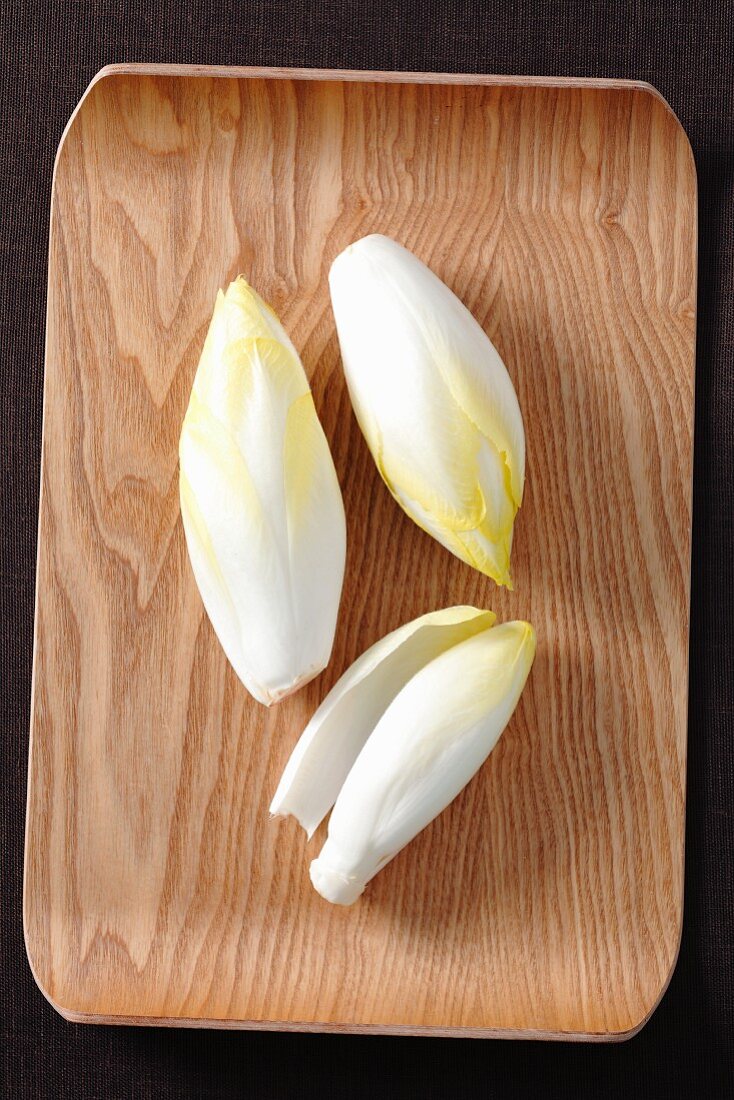 Chicory on a wooden tray