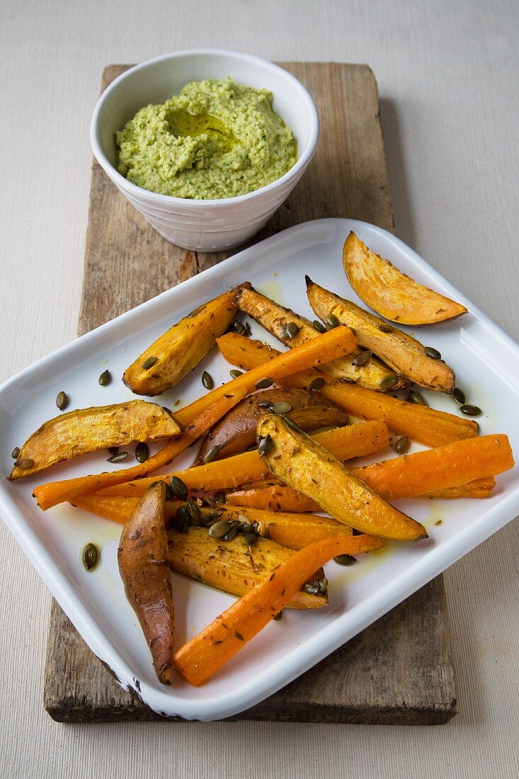 Deep-fried sweet potato wedges with houmous