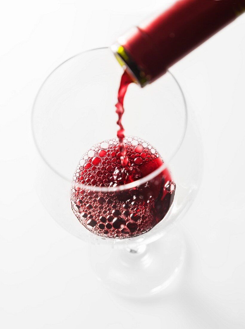 Wine Splashing into a Glass