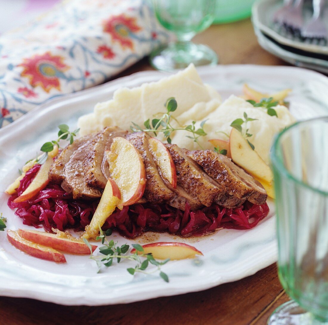 Roast pork with apple & red cabbage medley and mashed potato