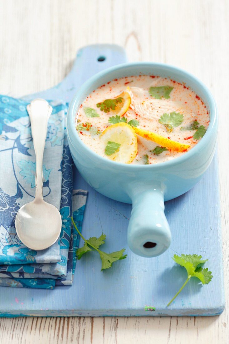 Chicken and lemon soup with coriander leaves